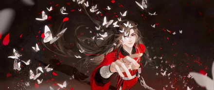 Hua Cheng from Tian Guan Ci Fu surrounded by glowing white butterflies and red petals in a dramatic 4K Ultra HD anime desktop wallpaper.