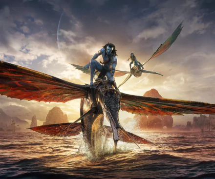 HD desktop wallpaper of Avatar: The Way of Water, depicting characters riding winged creatures over a water landscape with a majestic sunset in the background.
