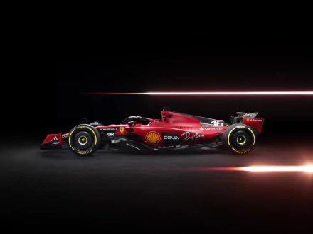 High-resolution 8K Ultra HD PC desktop wallpaper featuring a sleek red Ferrari F1 race car with dynamic light streaks on a black background.
