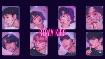 HD PC desktop wallpaper featuring members of Stray Kids with playful heart and star stickers, highlighting their music and vibrant personalities.