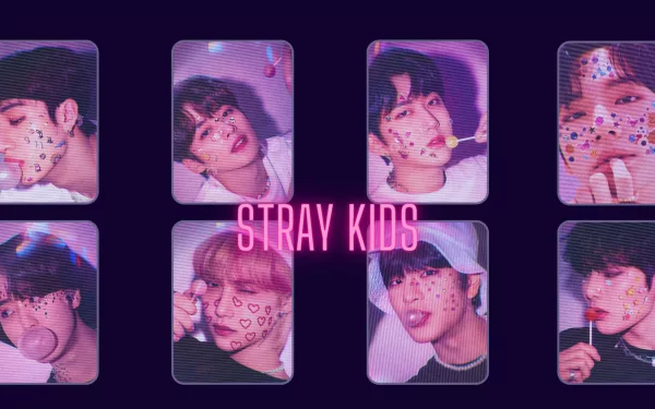 HD PC desktop wallpaper featuring members of Stray Kids with playful heart and star stickers, highlighting their music and vibrant personalities.