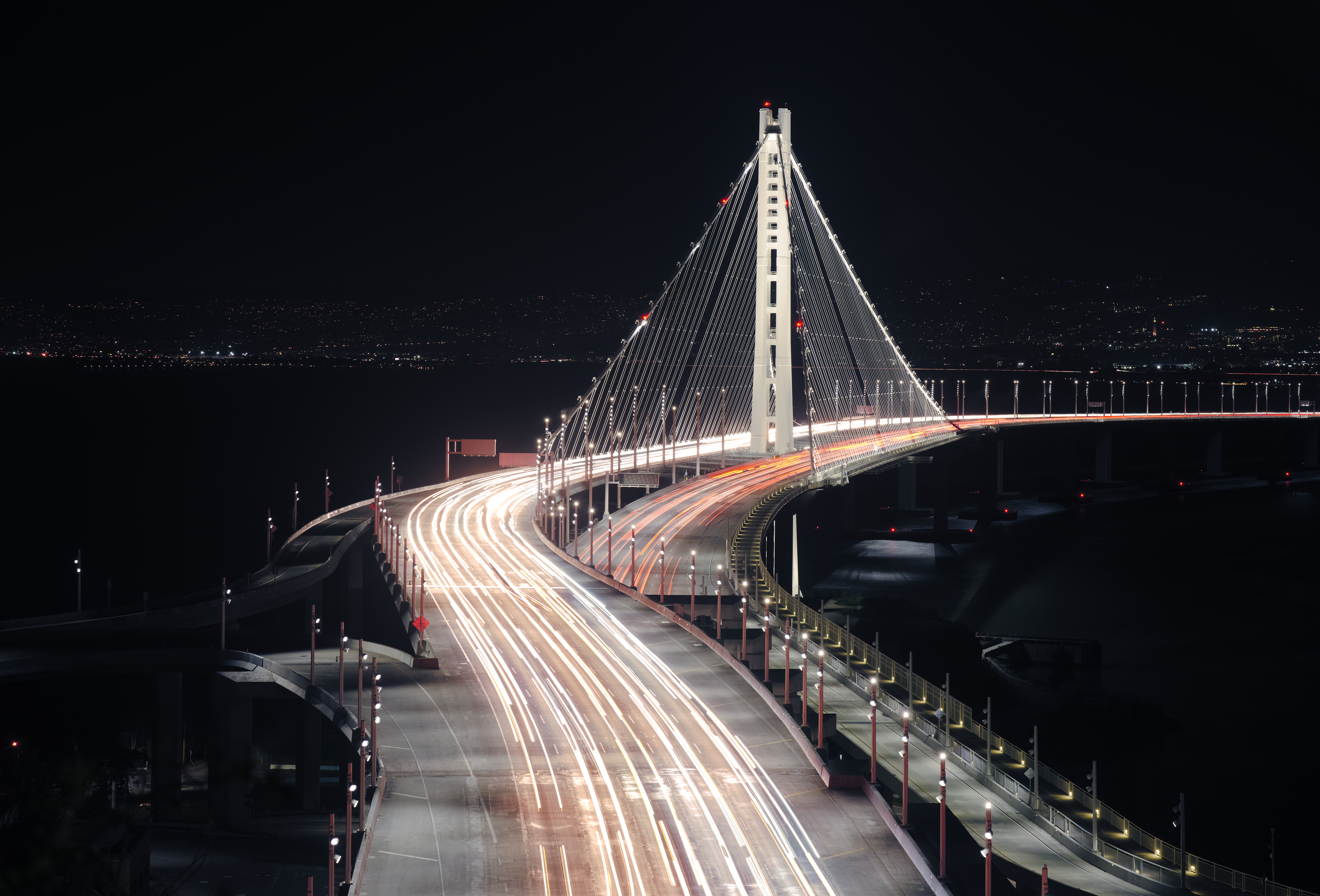 Eastern span of the San Francisco Oakland Bay Bridge at night as seen from Yerba Buena Island by Dllu