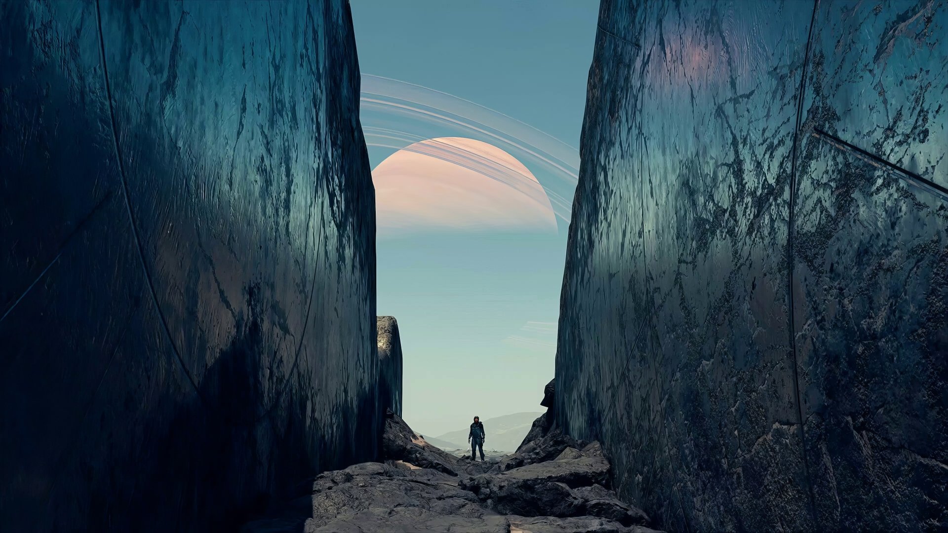 4K Ultra HD Starfield video game wallpaper showing a lone figure standing between towering rock walls, with a large ringed planet visible in the sci-fi landscape sky.