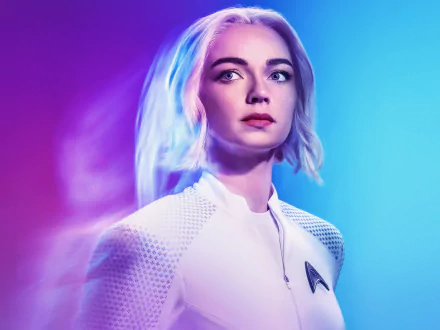 Christine Chapel in a white Starfleet uniform, bathed in purple-blue light — 2K Quad HD PC desktop wallpaper from the TV show Star Trek: Strange New Worlds.