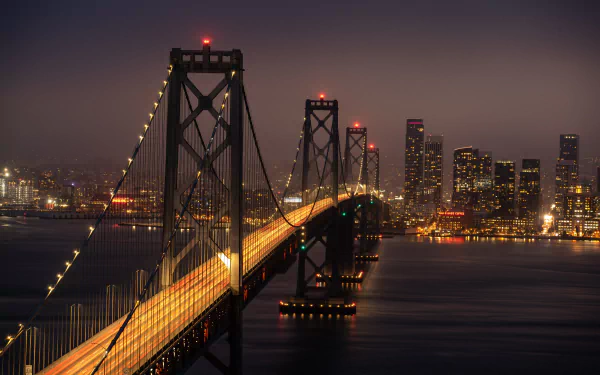 Stunning HD wallpaper of the San Francisco Bay Bridge, showcasing impressive man-made architecture against a picturesque backdrop of the city.