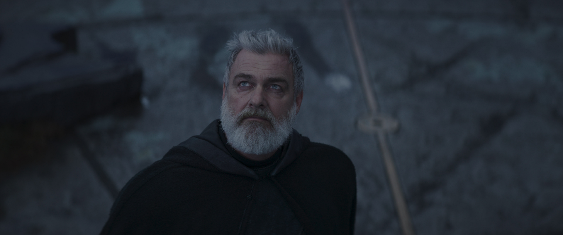 A captivating HD wallpaper featuring Baylan Skoll from the TV show Ahsoka (2023), portraying a moment of intensity and intrigue in a dramatic setting.