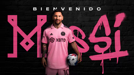 HD desktop wallpaper featuring Lionel Messi in an Inter Miami CF jersey, standing in front of a black wall with a large MESSI graffiti in pink.