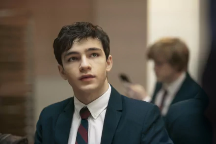 Young actor wearing a suit in HD desktop wallpaper.