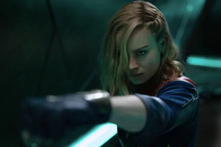 HD desktop wallpaper featuring Carol Danvers as portrayed in The Marvels movie, focusing intently in a combat stance.