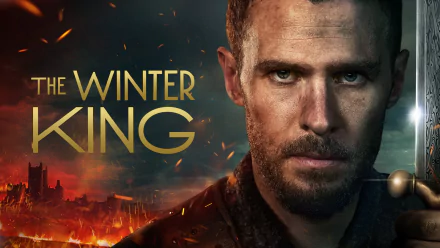 HD desktop wallpaper featuring Iain De Caestecker in The Winter King with a fiery battlefield background.