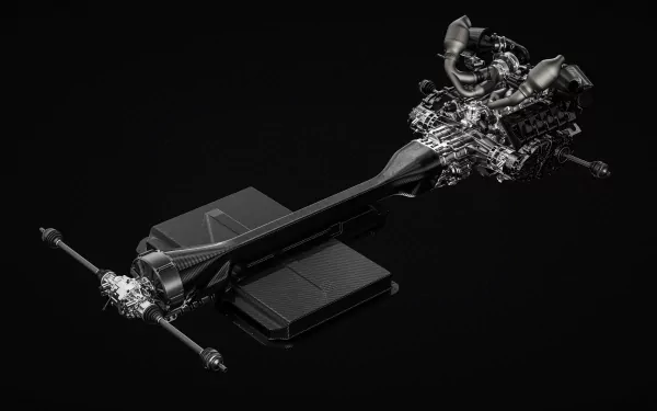 HD desktop wallpaper of a Koenigsegg Gemera's detailed drivetrain components displayed on a black background.