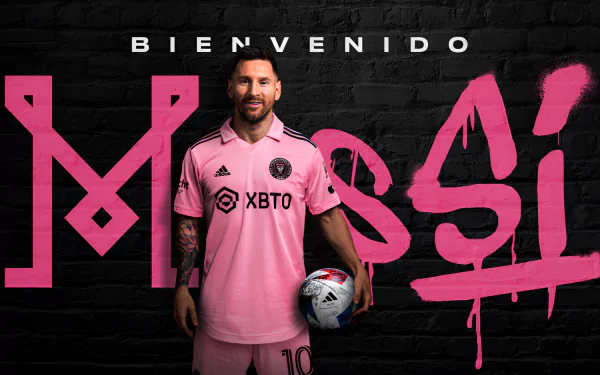 HD desktop wallpaper featuring Lionel Messi in an Inter Miami CF jersey, standing in front of a black wall with a large MESSI graffiti in pink.