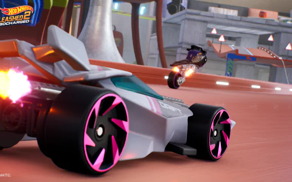 HD desktop wallpaper from Hot Wheels Unleashed 2: Turbocharged featuring two intense racing cars on a dynamic track.