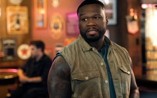 HD desktop wallpaper featuring a still from Expend4bles with 50 Cent in a bar setting.