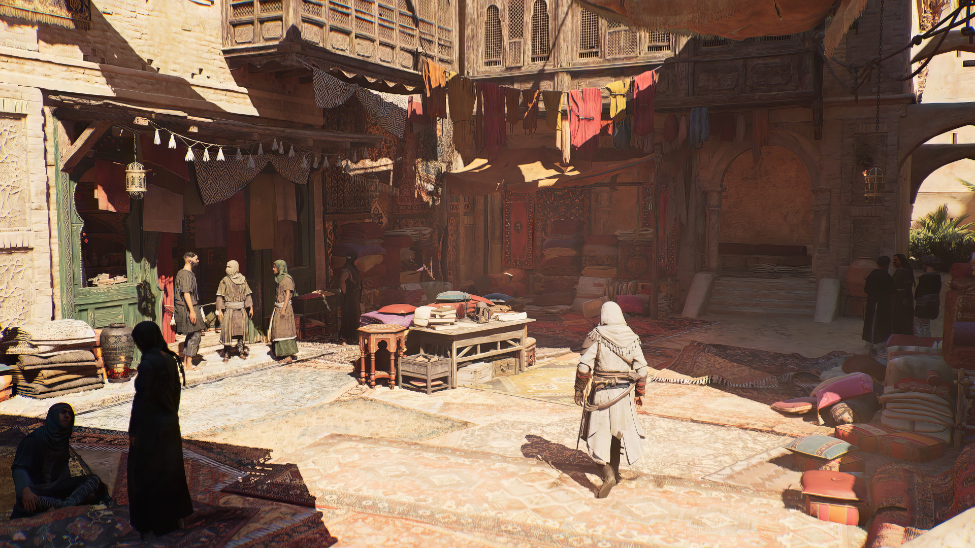 HD wallpaper of Assassin's Creed Mirage featuring a character in a bustling market scene from the game.