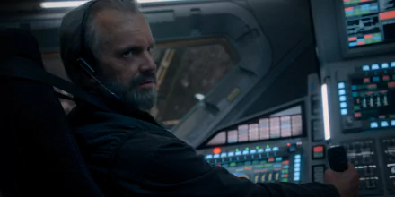 Alt-text: HD desktop wallpaper featuring a scene from For All Mankind with a character in a spacecraft cockpit, showcasing the series' space exploration theme.