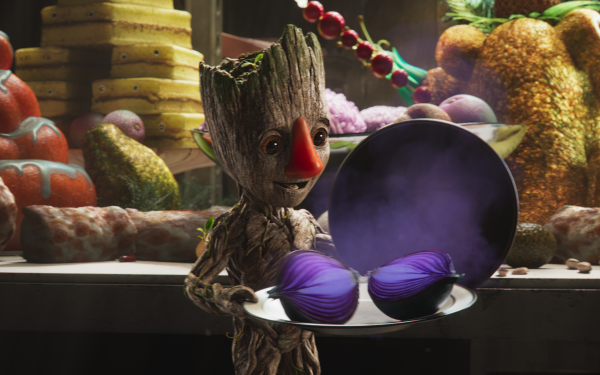 HD desktop wallpaper featuring the animated character Groot holding a round object, set against a vibrant fruit market background, perfect for 'I Am Groot' fans.