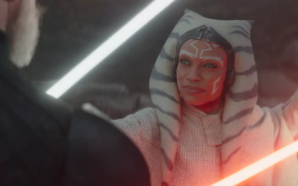 HD wallpaper featuring Ahsoka Tano with lightsabers for a dynamic desktop background.