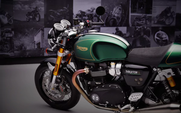 HD desktop wallpaper featuring a Triumph Thruxton Final Edition motorcycle in a showroom setting.