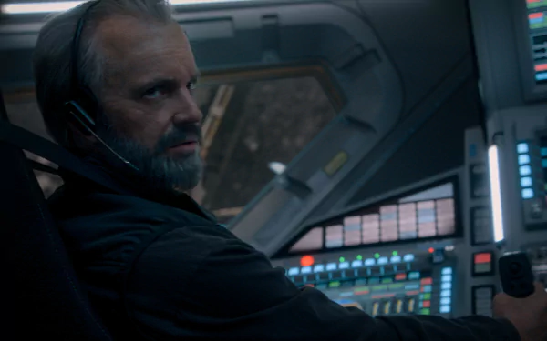 Alt-text: HD desktop wallpaper featuring a scene from For All Mankind with a character in a spacecraft cockpit, showcasing the series' space exploration theme.