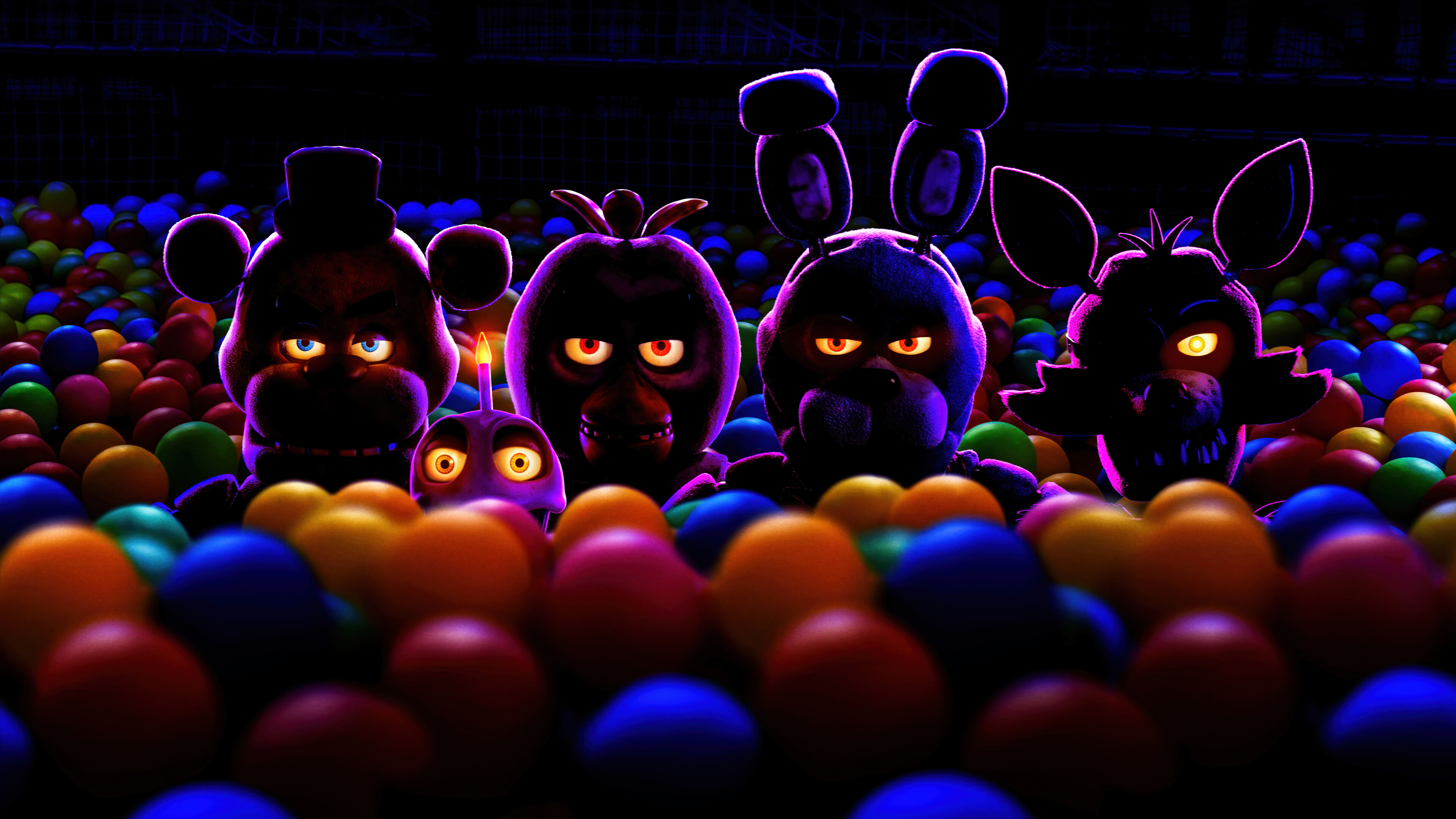 Five Nights at Freddy's characters peeking out from a colorful ball pit in HD desktop wallpaper background.