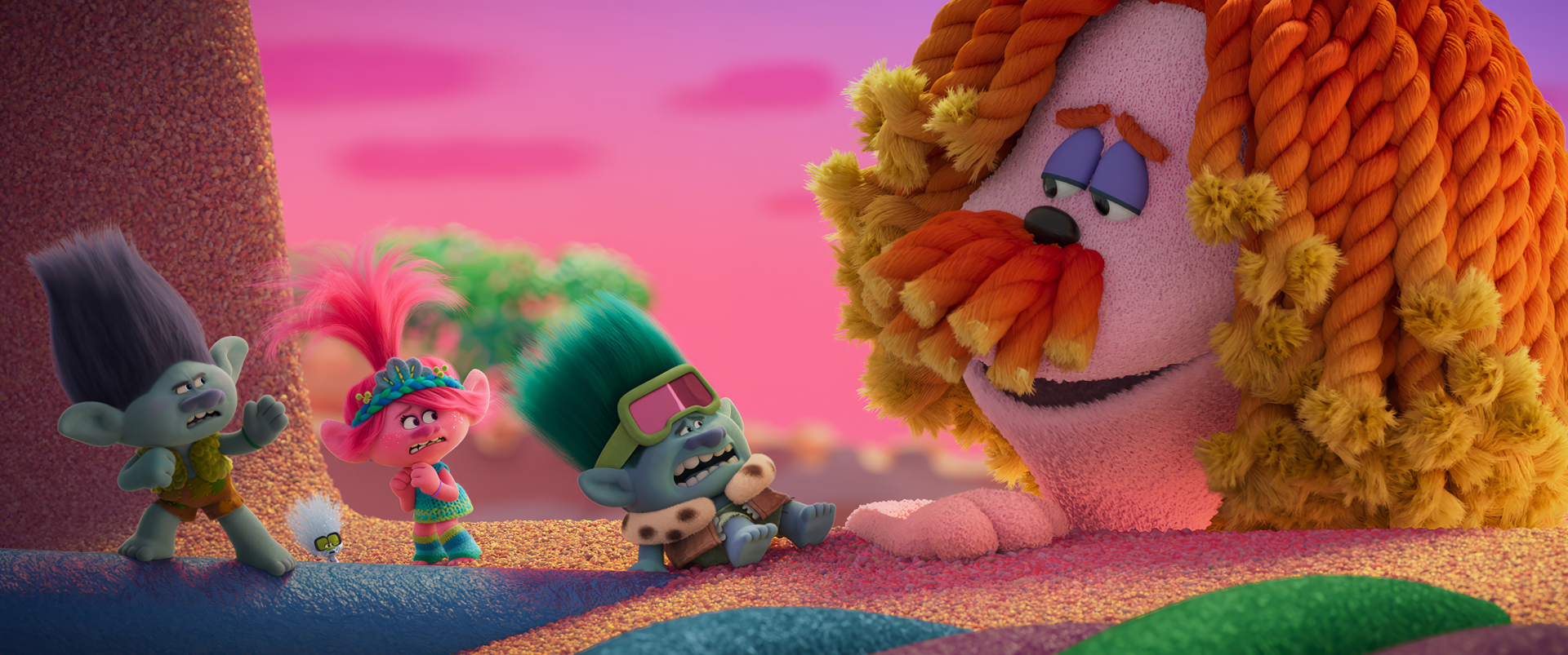 HD wallpaper of colorful Trolls characters banding together for desktop background, with vibrant pink skies and textured landscape.