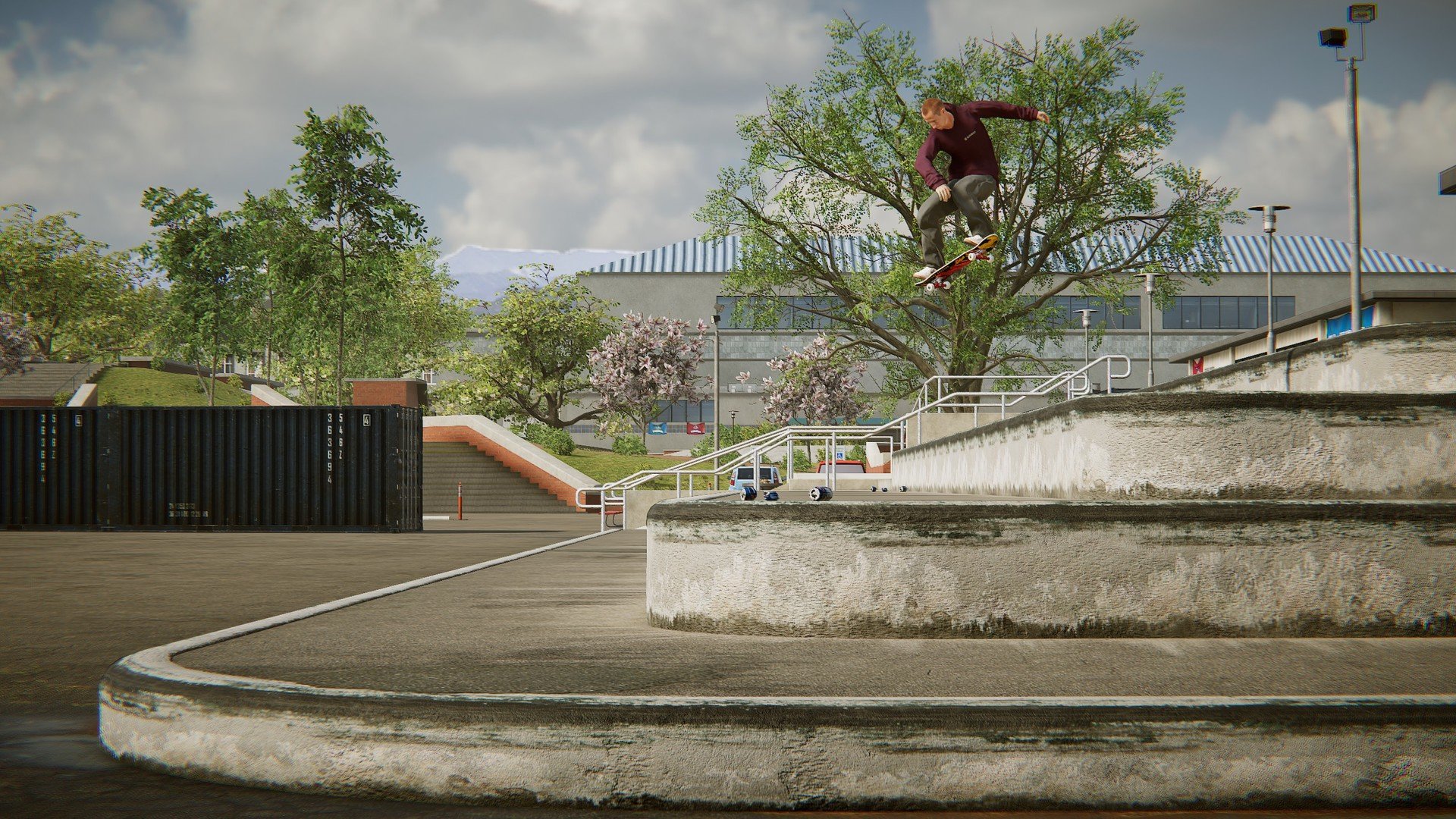 HD desktop wallpaper featuring a Skater XL gameplay scene with a skater performing a trick in a realistic urban skatepark setting.
