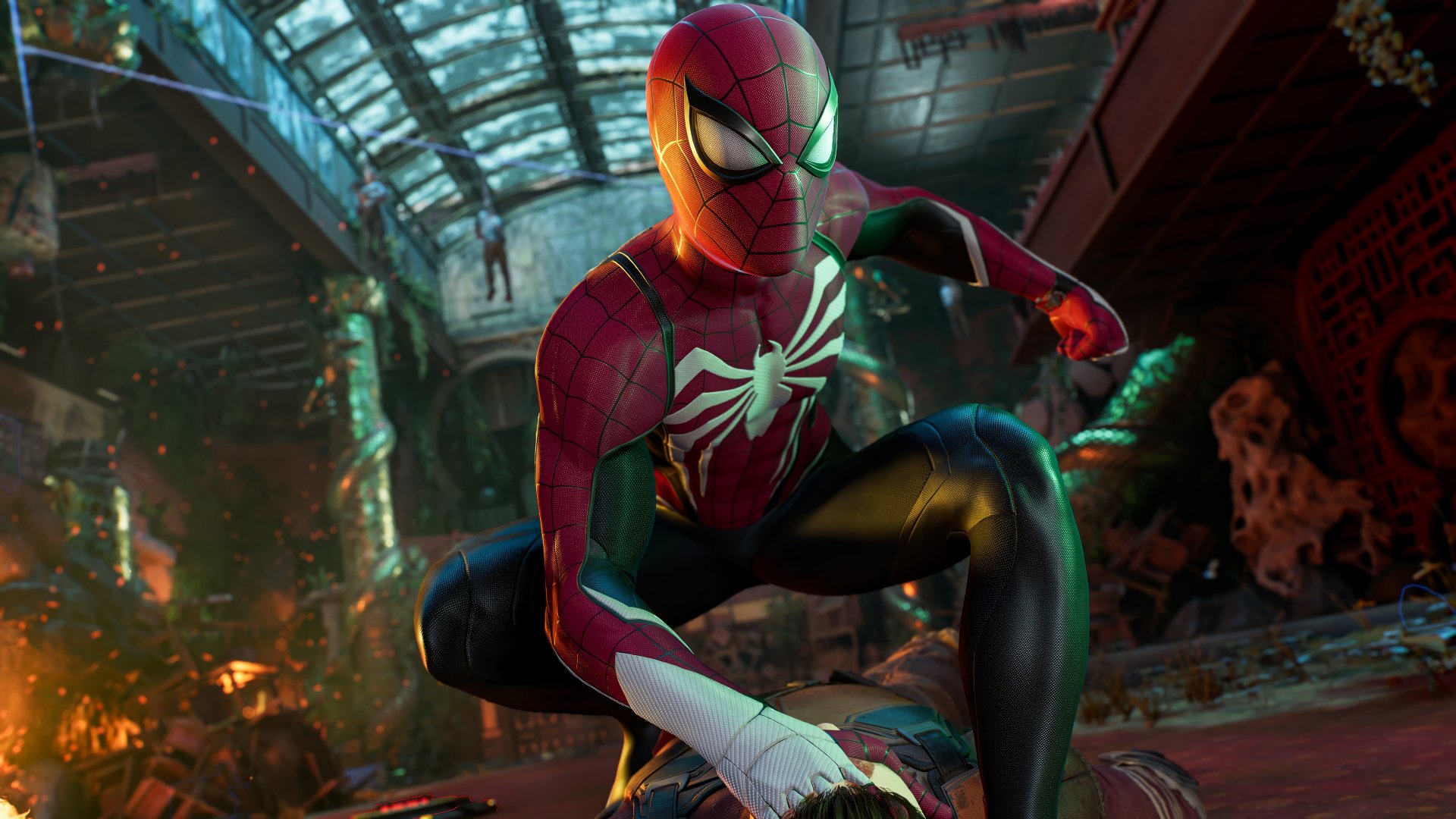 HD wallpaper featuring Spider-Man from Marvel's Spider-Man 2 video game, posed dynamically in a detailed urban environment.