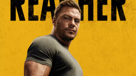 HD desktop wallpaper featuring the promotional artwork for the TV show 'Reacher' with the lead character portrayed by Alan Ritchson against a yellow background.