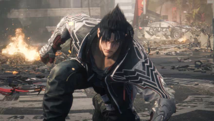Jin Kazama from Tekken 8 crouches in a dramatic pose against a gritty backdrop, capturing the intensity of this HD video game wallpaper.