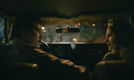 An intense scene from the 2024 TV show 'Griselda' featuring two characters in a dimly lit car interior, available as an HD desktop wallpaper and background.