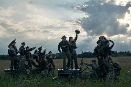 Group of military personnel in period uniforms gazing skyward against a dramatic cloud-filled sky in a high-definition 'Masters of the Air' TV show desktop wallpaper.