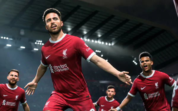 HD wallpaper featuring dynamic in-game action from EA SPORTS FC 24 with players in red Liverpool FC uniforms on the pitch.