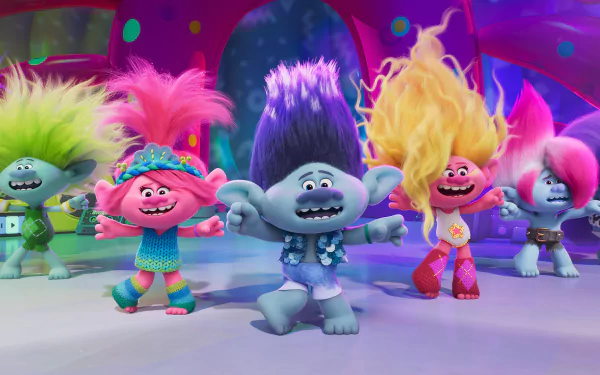 Colorful characters from the movie Trolls Band Together dance joyfully, showcasing vibrant hairstyles and playful expressions in this lively HD desktop wallpaper.