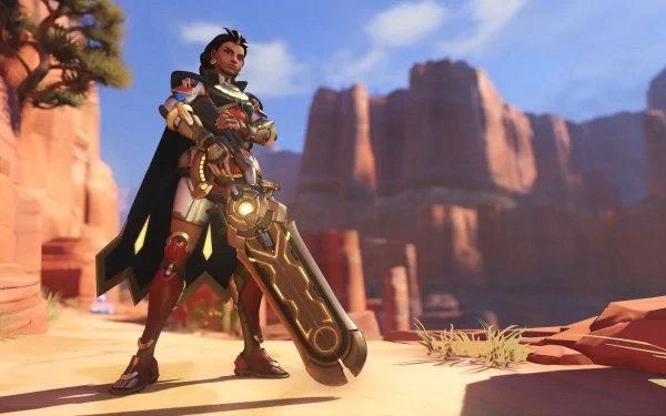 A vibrant HD wallpaper featuring Illari from Overwatch 2, standing confidently with her weapon in a dynamic desert landscape.