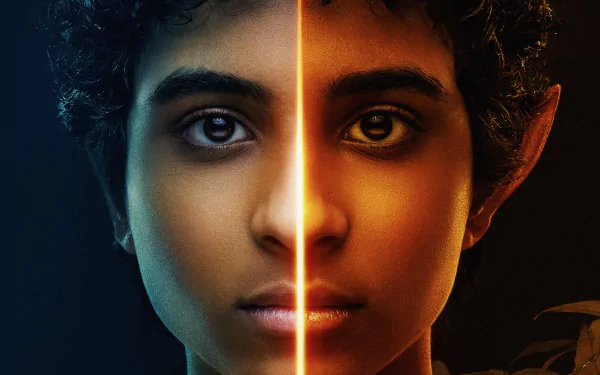 HD PC desktop wallpaper featuring a split close-up of a character from the TV show Percy Jackson and the Olympians, highlighting contrasting light and shadow.