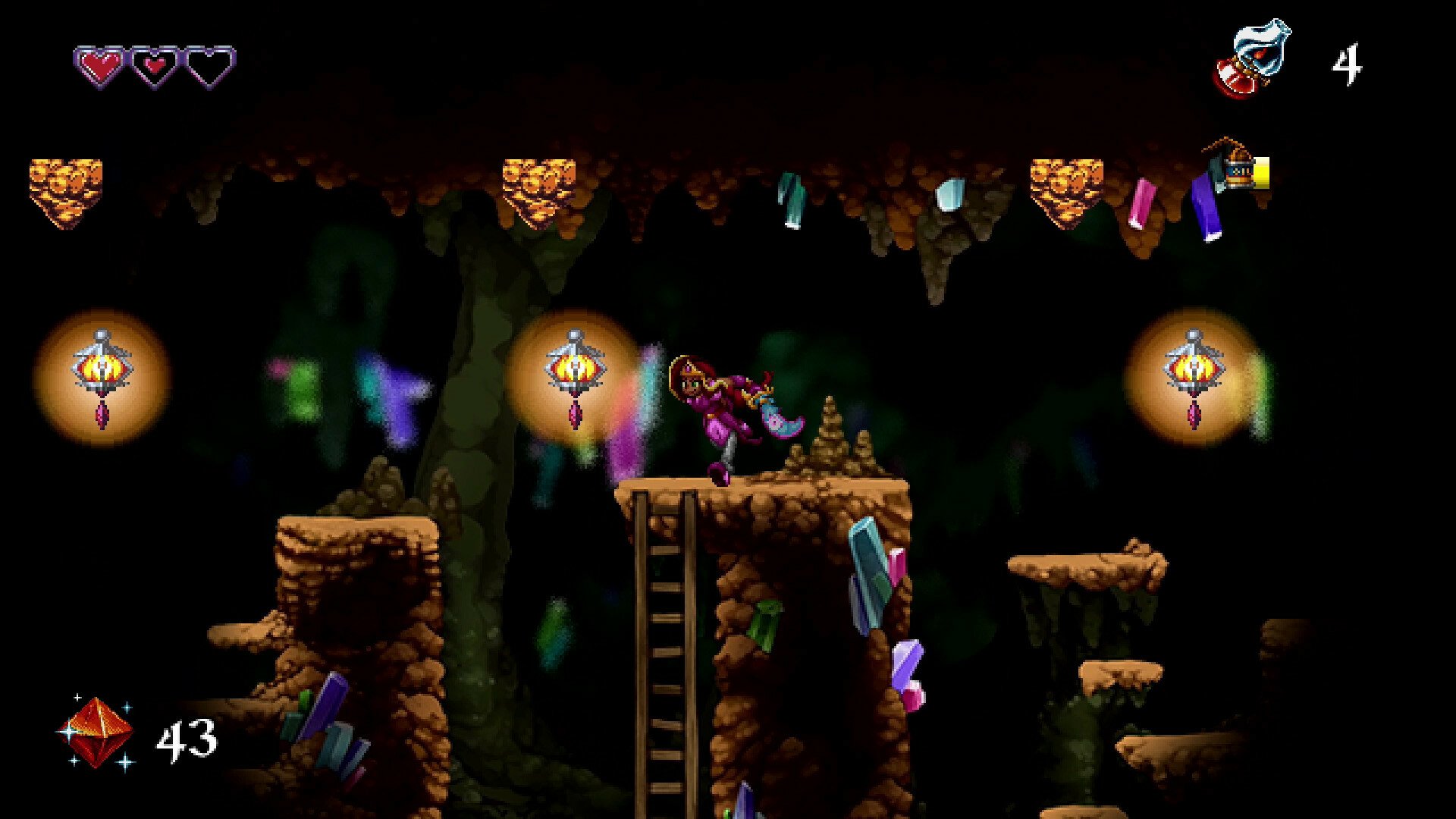 HD wallpaper of 'Arzette: The Jewel of Faramore' video game showing a character navigating through a crystal-laden cave level.