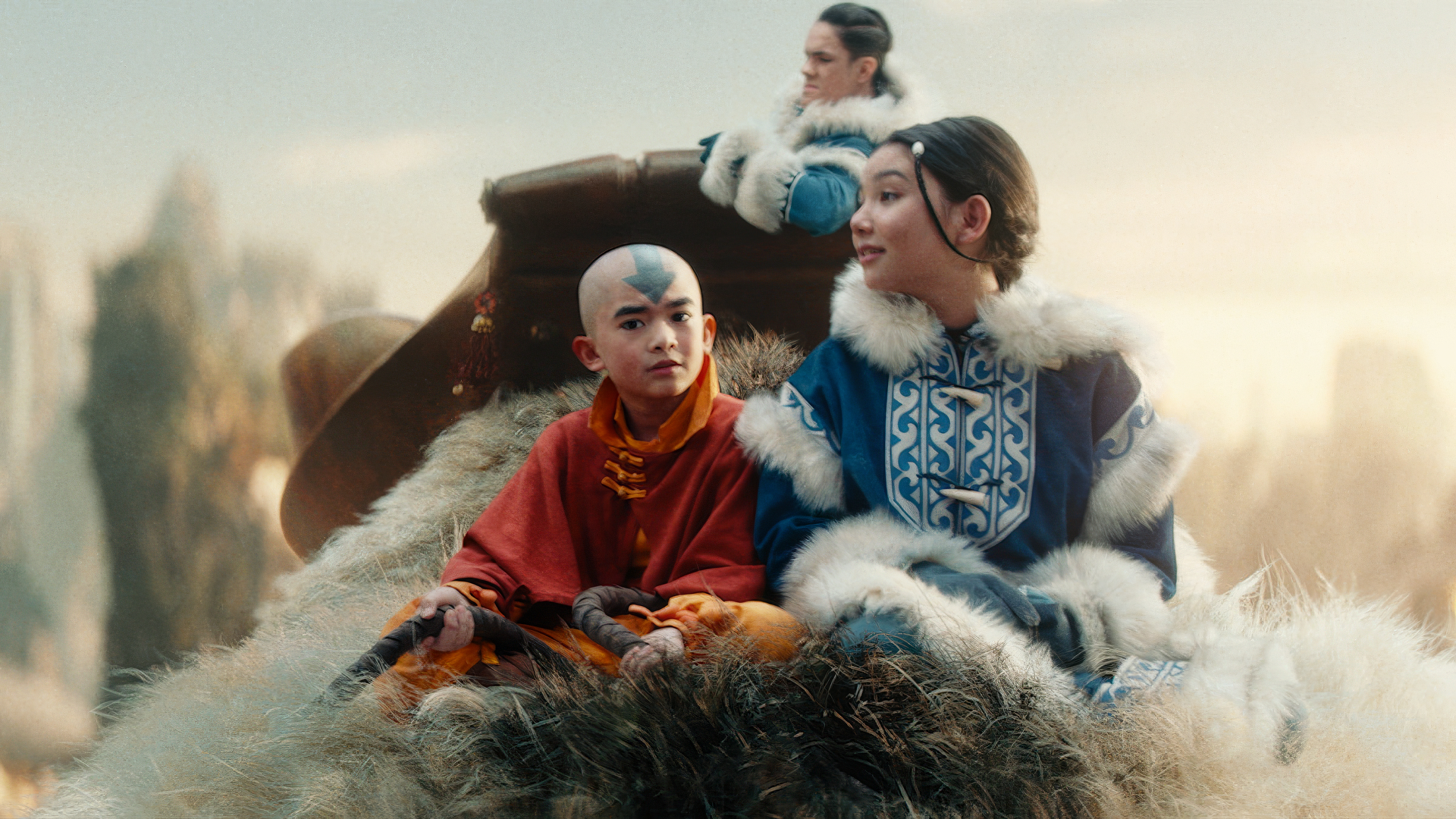 HD desktop wallpaper featuring characters Aang and Katara from the TV show Avatar: The Last Airbender, ready for an adventure with a mystical backdrop.
