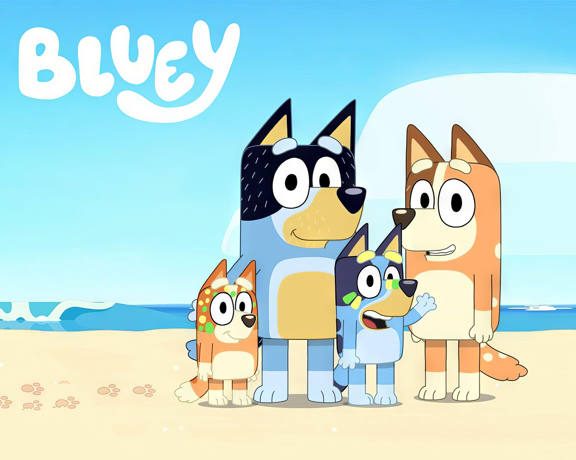 HD desktop wallpaper featuring characters from the TV show Bluey on a beach background.