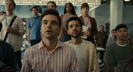 Group of diverse actors in a scene from a TV show for a high-definition desktop wallpaper themed around The American Society of Magical Negroes.