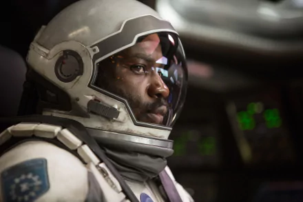 HD wallpaper of an astronaut character from the movie Interstellar, with a close-up inside a spacecraft.