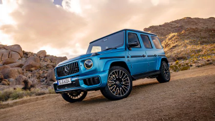 Blue Mercedes-AMG G63 on mountain road - HD wallpaper of luxury car from Mercedes-Benz.