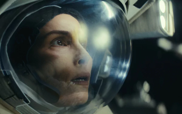 HD desktop wallpaper featuring an intense scene from the TV show Constellation (2024) with an astronaut wearing a helmet.