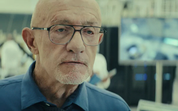 Close-up of Jonathan Banks in a scene from the TV show Constellation (2024), set against a backdrop of a high-tech environment, serving as an HD desktop wallpaper.