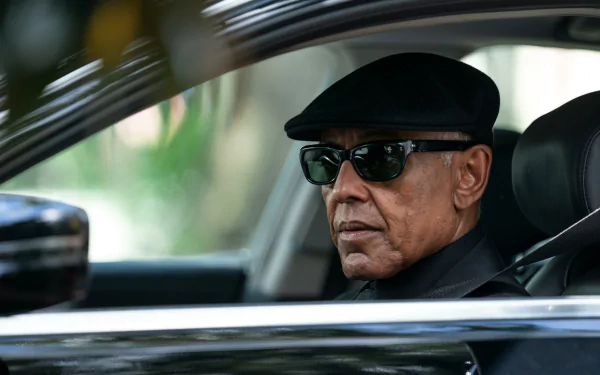 Stylish character wearing sunglasses and a beret driving a car from the TV show 'Parish (2024)' featured as an HD desktop wallpaper.