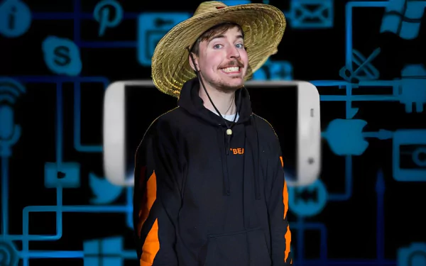 Smiling man wearing a straw hat and black hoodie with a tech-themed backdrop for an HD desktop wallpaper.