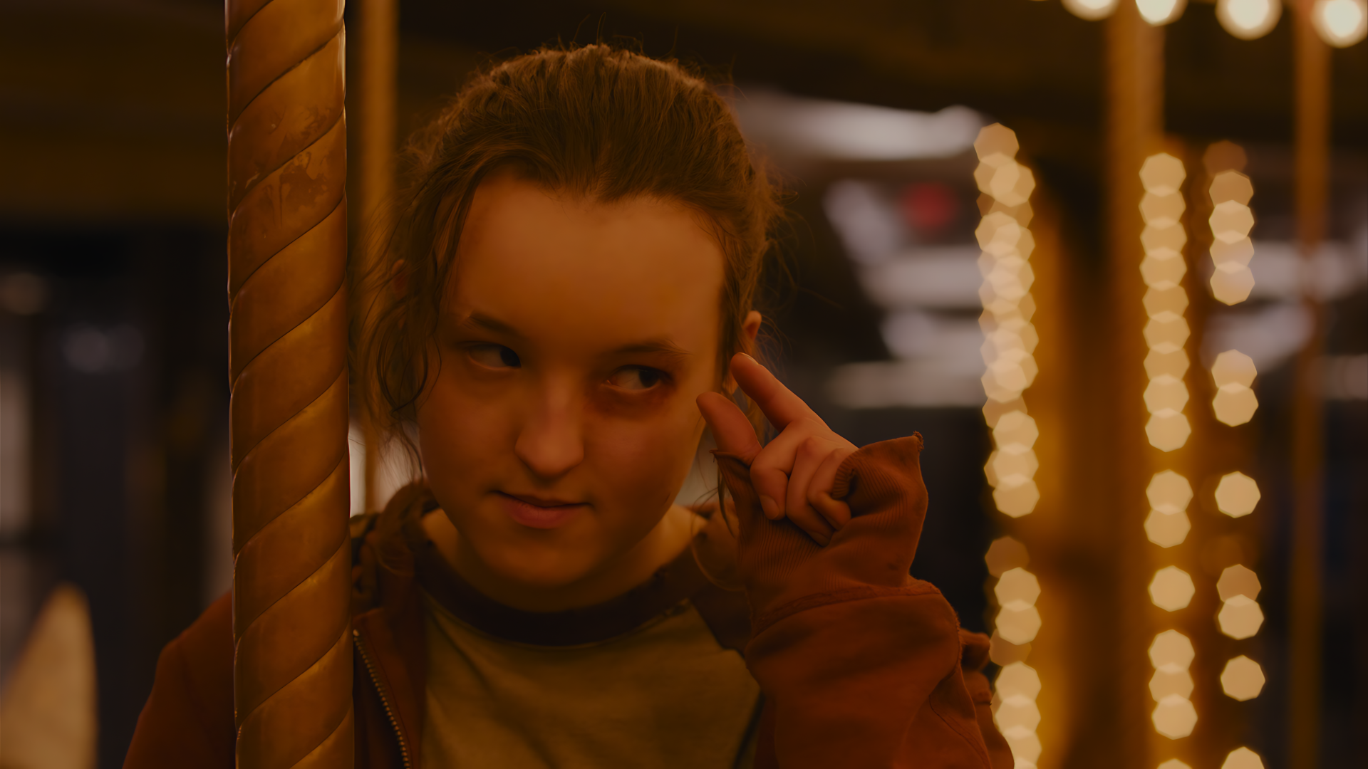 Close-up of a character from The Last Of Us with a contemplative expression, set against a softly lit carousel background in 8K Ultra HD PC wallpaper quality.