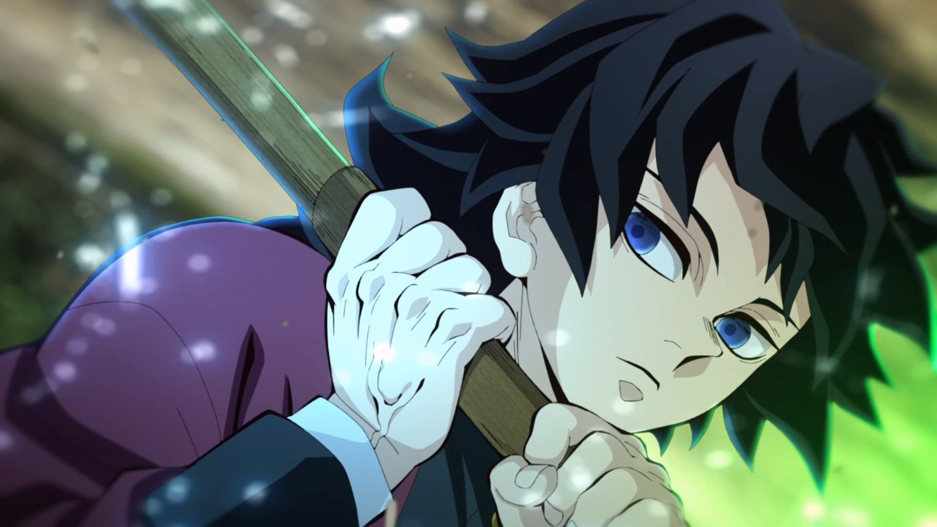 HD desktop wallpaper of Giyuu Tomioka, the Water Hashira from Demon Slayer: Kimetsu no Yaiba, gripping his sword with a focused expression.