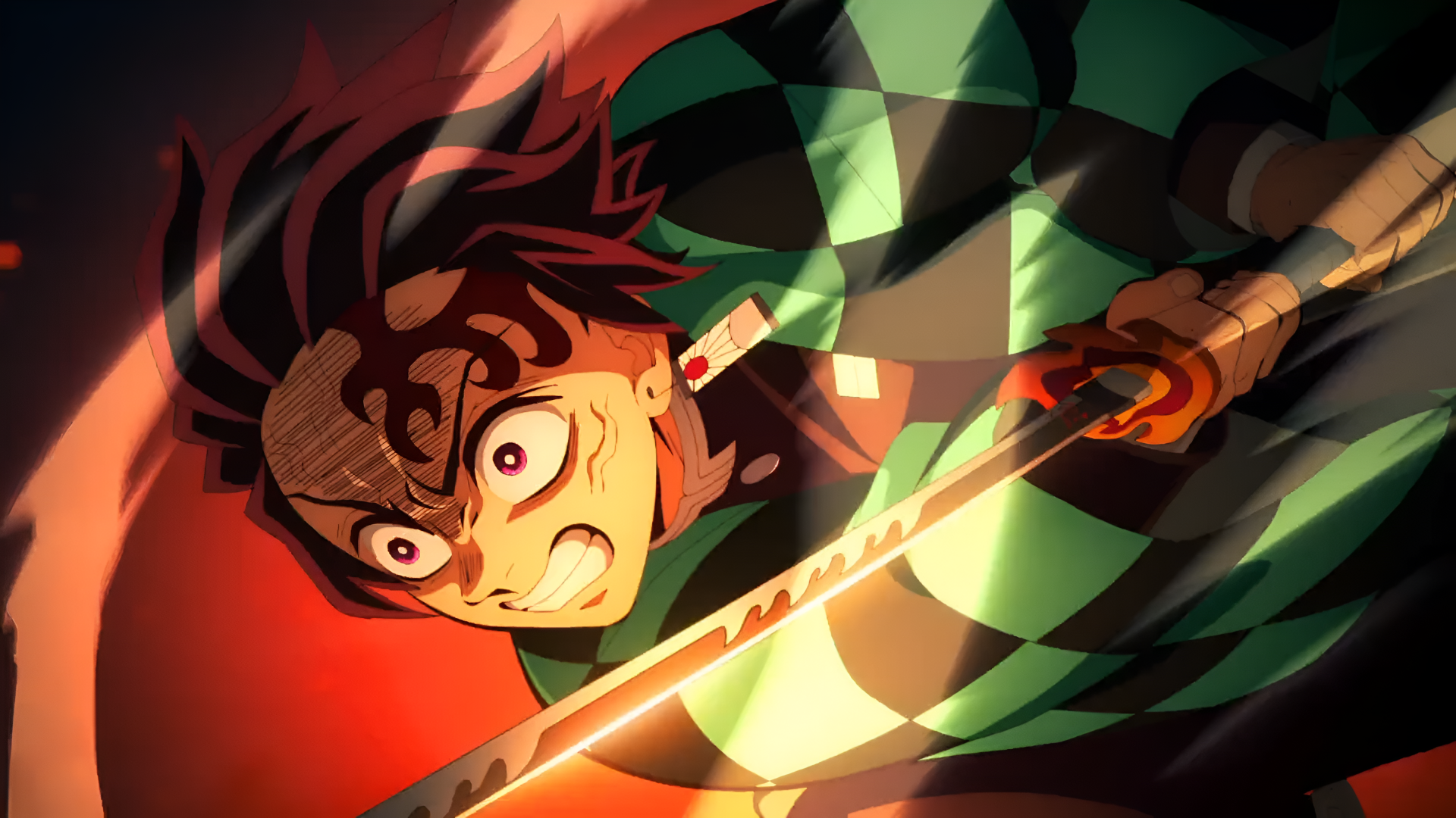 4K Ultra HD anime wallpaper featuring Tanjiro Kamado from Demon Slayer: Kimetsu no Yaiba, captured in a dynamic action pose with vivid lighting and intense expression.
