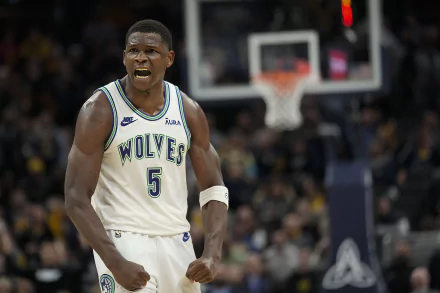 Anthony Edwards of the Minnesota Timberwolves celebrates during a game, captured in an HD desktop wallpaper.